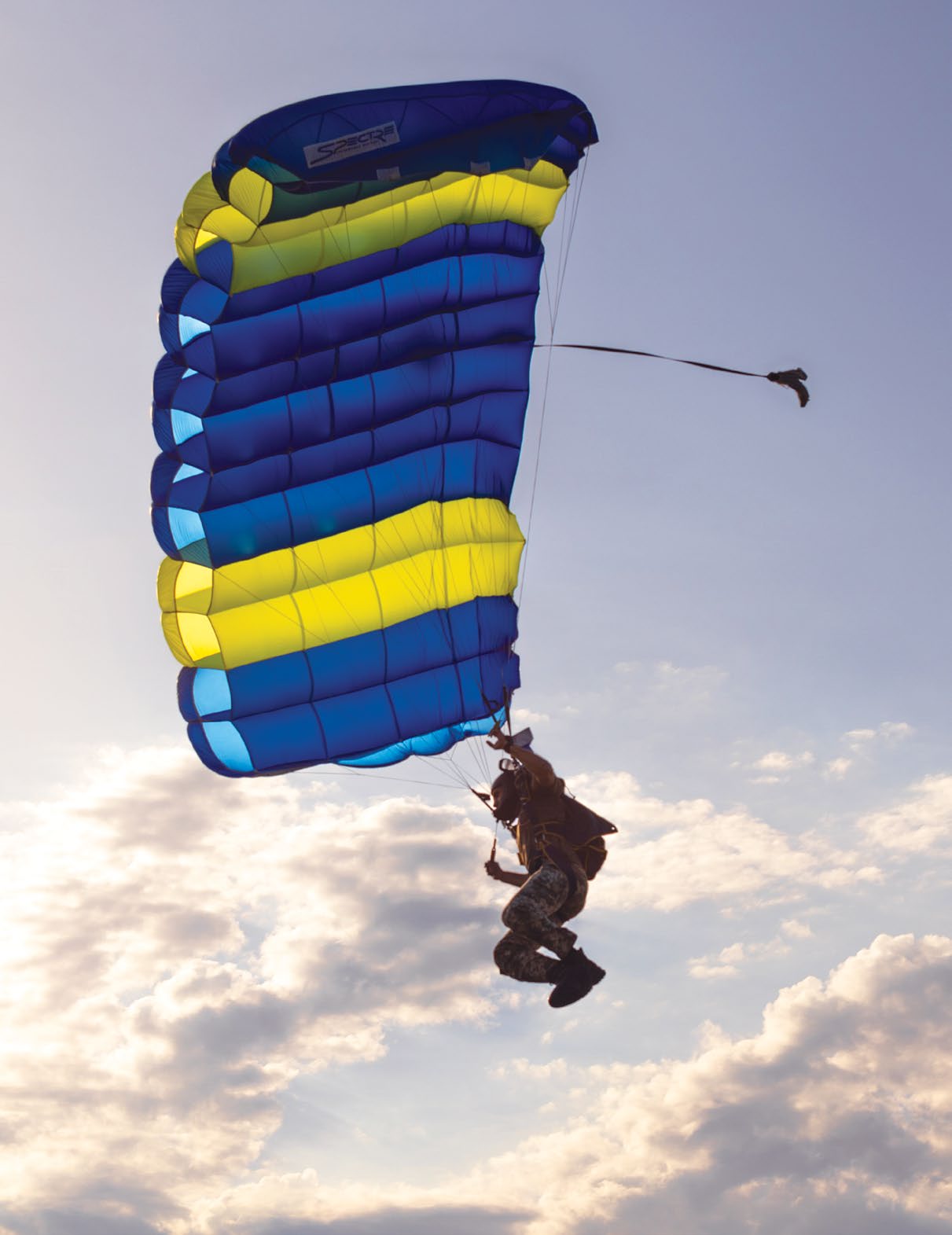 A Ukrainian Special Forces soldier prepares to land during a military free fall with U.S. Navy SEALs from a CV-22 Osprey assigned to the 352nd Special Operations Wing during exercise Sea Breeze 21 in Ochakiv, Ukraine, July 1, 2021. Exercise Sea Breeze 21 is a U.S. and Ukraine co-hosted multinational maritime exercise held in the Black Sea designed to enhance interoperability of participatingnations and strengthen maritime security within the region. (U.S. Army Photo by Sgt. Patrik Orcutt.)